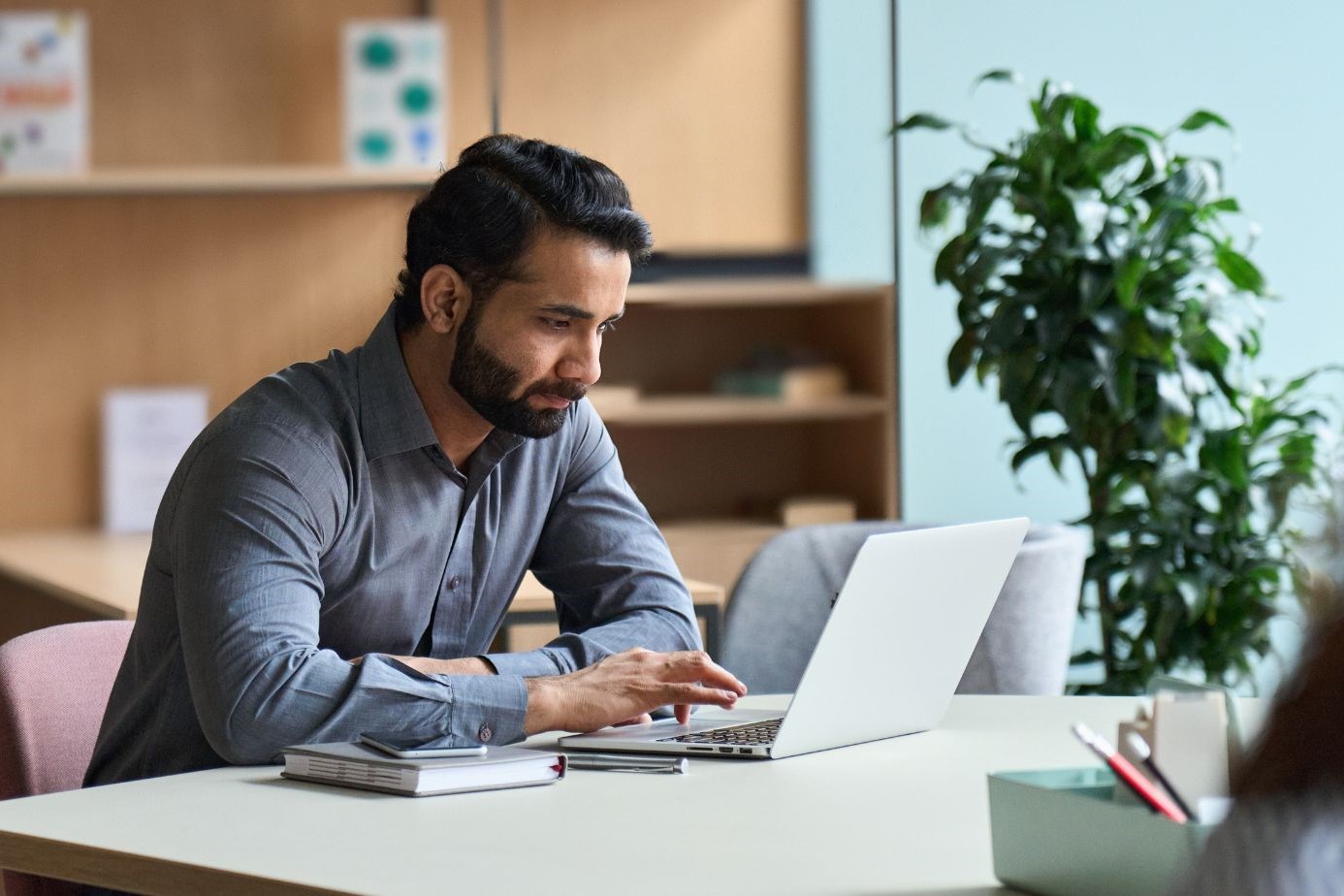 Woman sitting with laptop